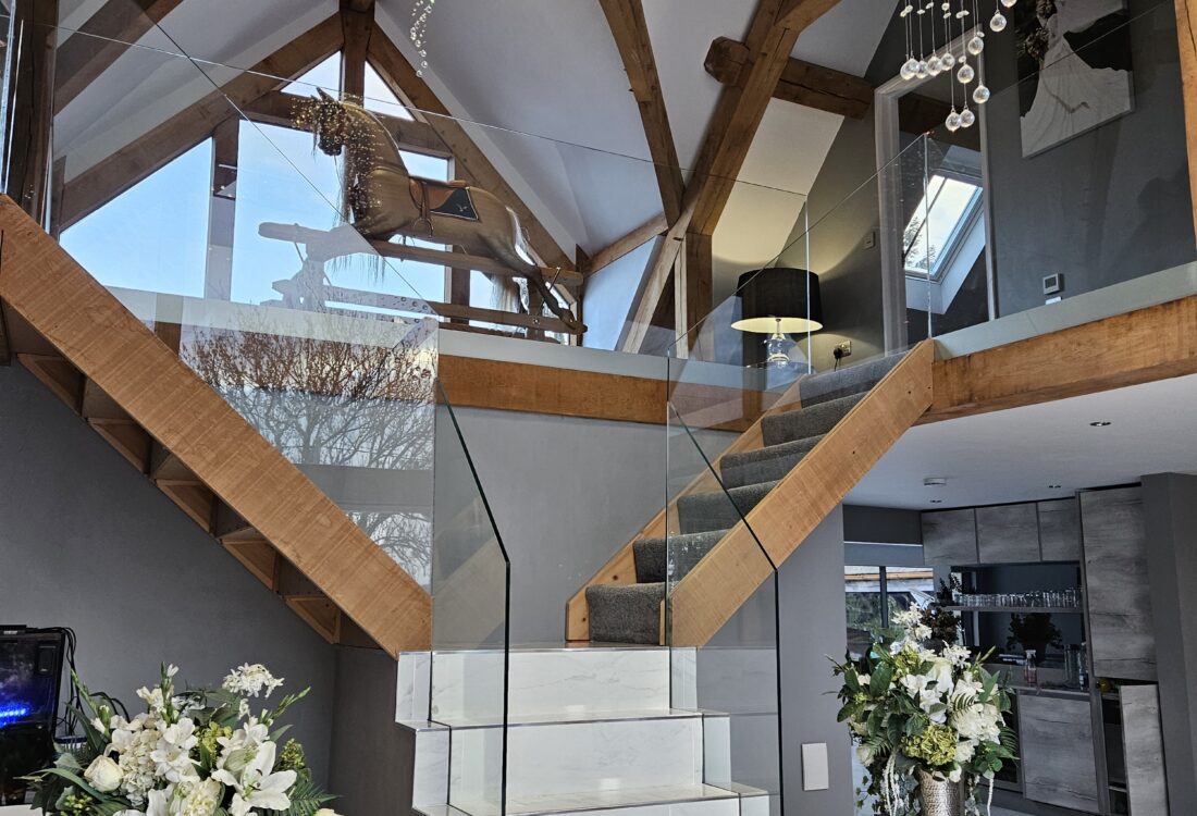 Oak framed house with glass entrance